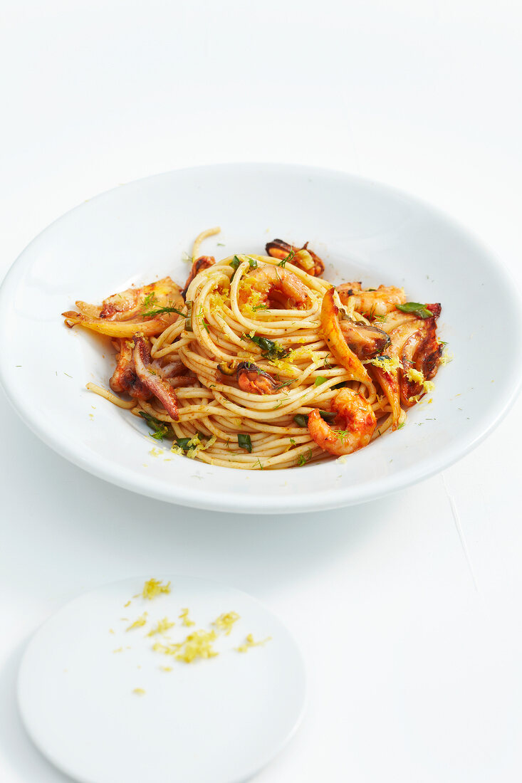 Spaghetti with seafood on plate