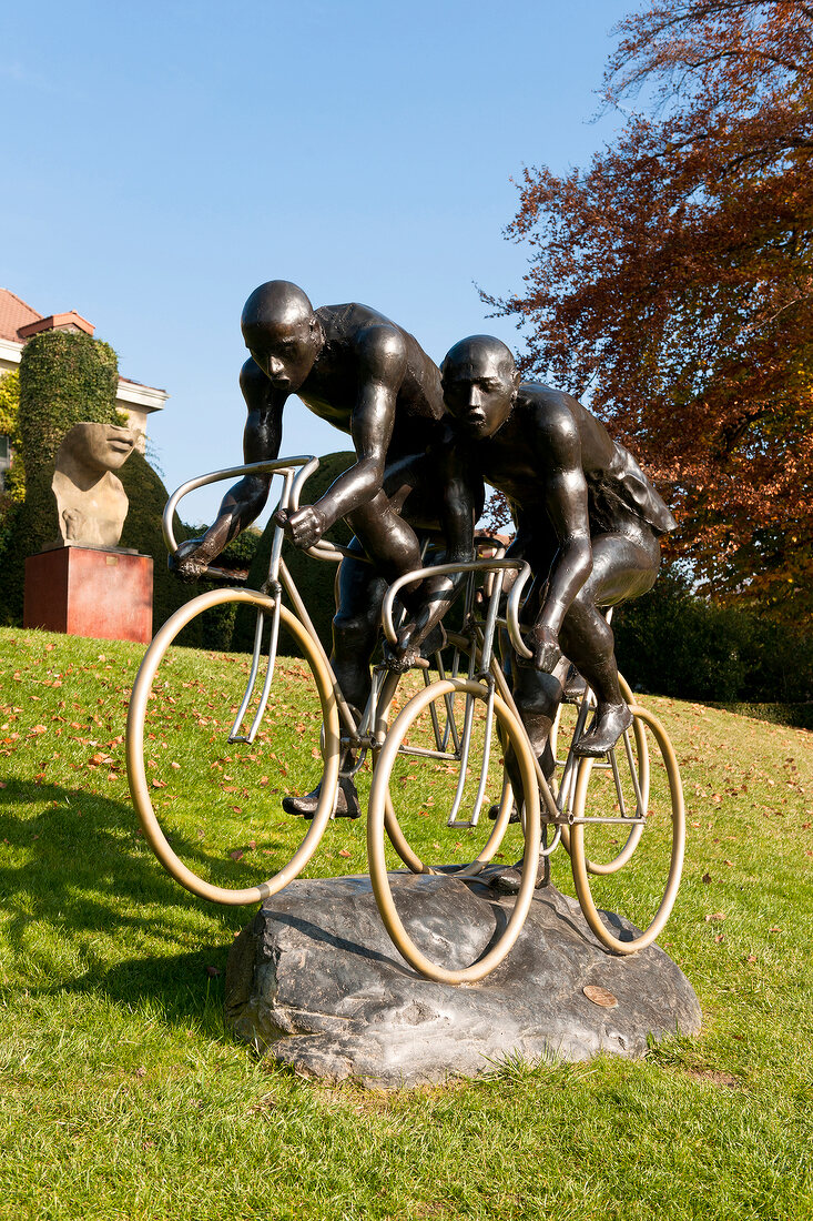 Statue of two cyclists in Olympic Museum Park at Lausanne, Canton of Vaud, Switzerland