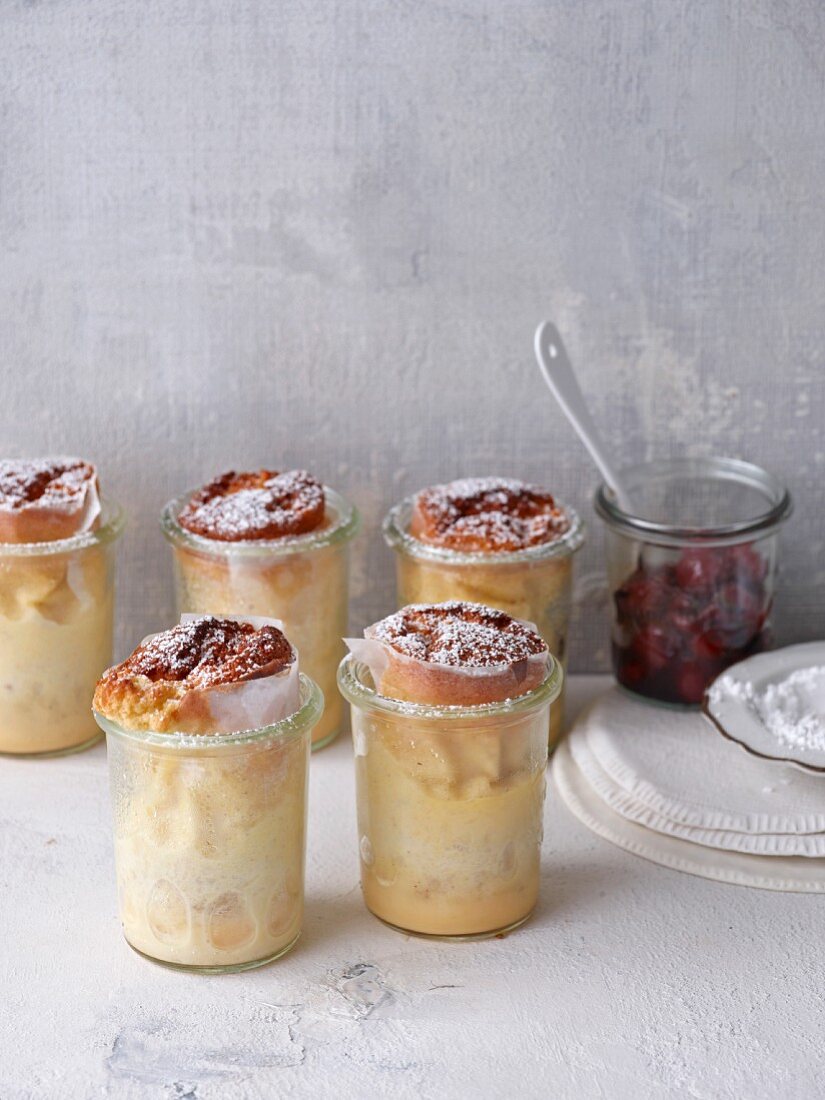 Quark pudding with cherry compote in glasses