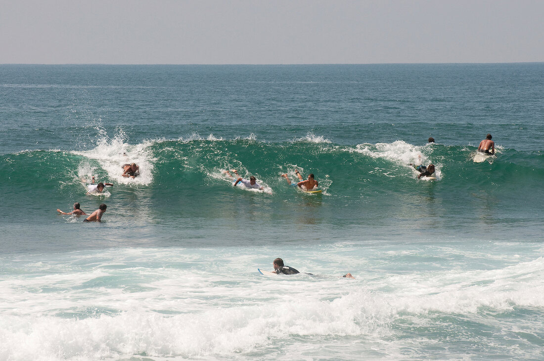 People surfing in Indian Ocean, Sri Lanka