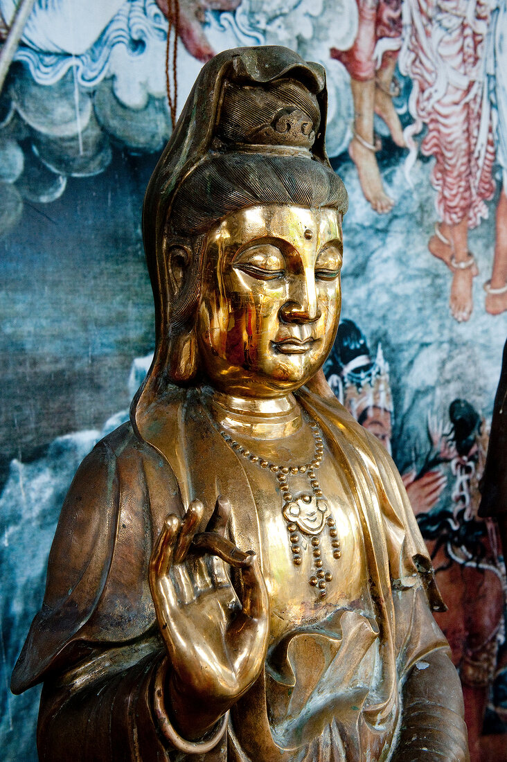 Close-up of Buddha sculpture in mudra position in temple, Colombo, Sri Lanka