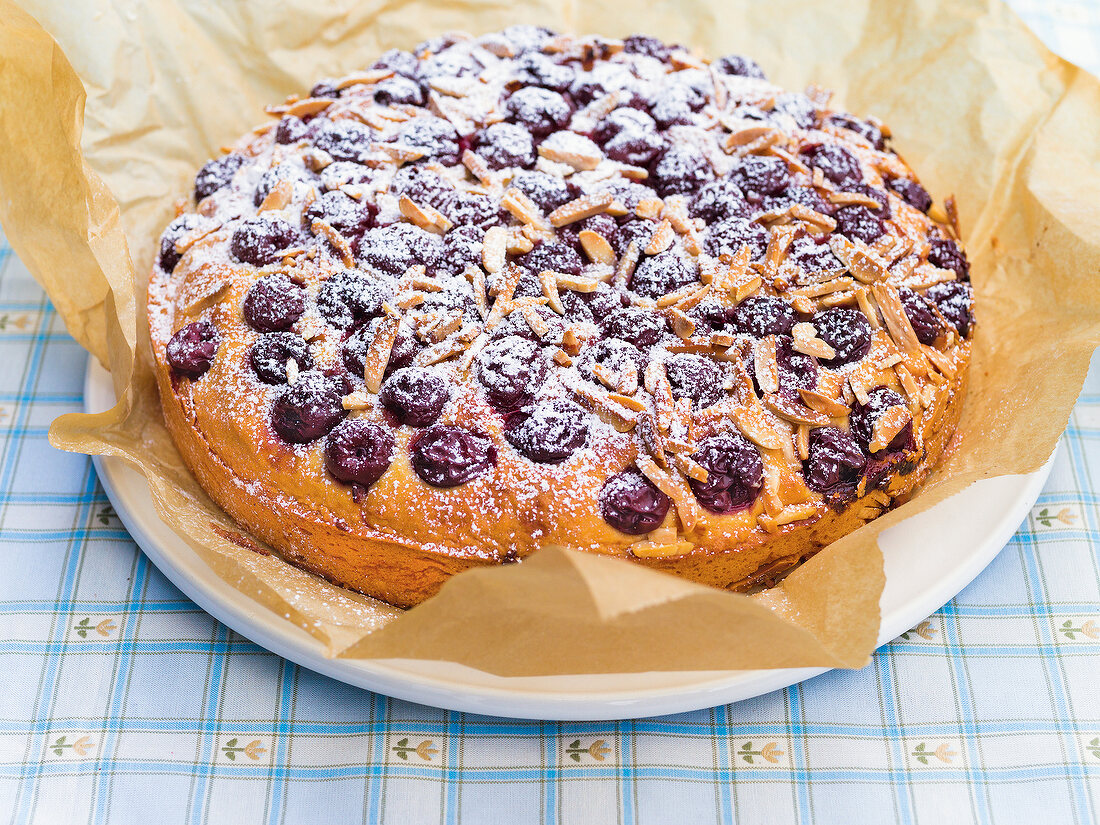 Almond and cherry cake on plate