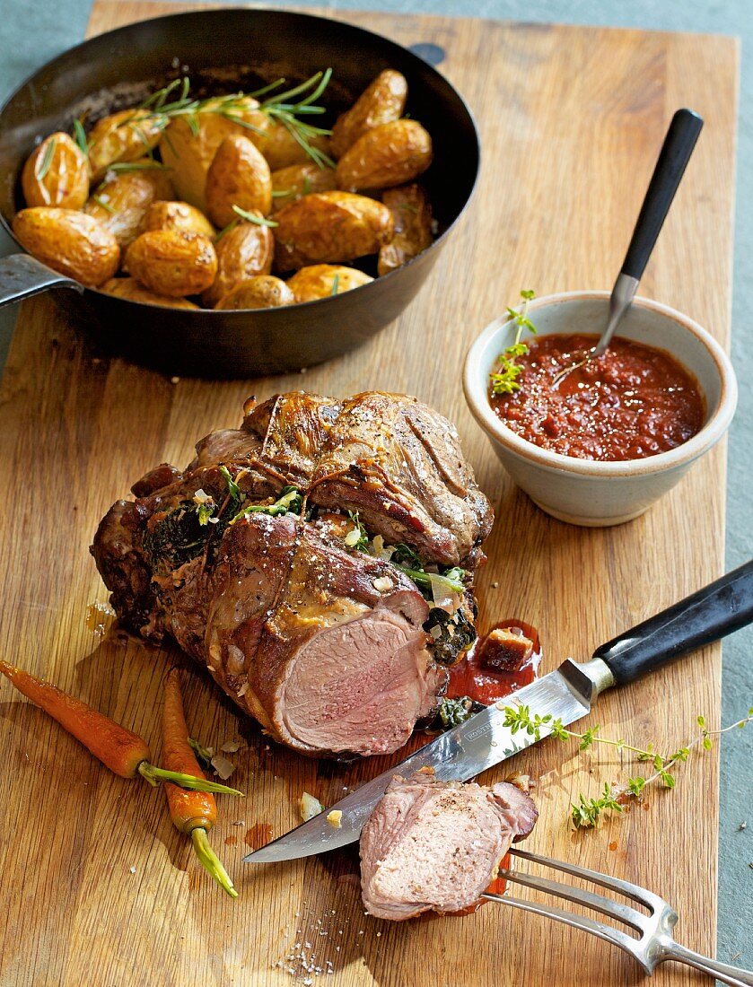 Braised leg of lamb with a spinach and herb stuffing
