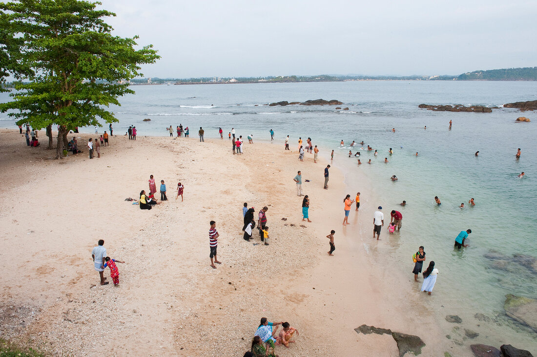 View of people at beach at Galle Fort, Sri Lanka