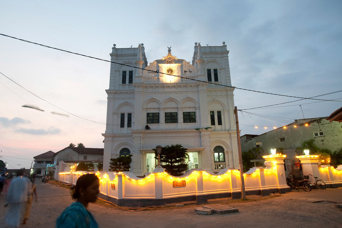 View of illuminated Meera Mosque with people at night, Sri Lanka, Galle Fort