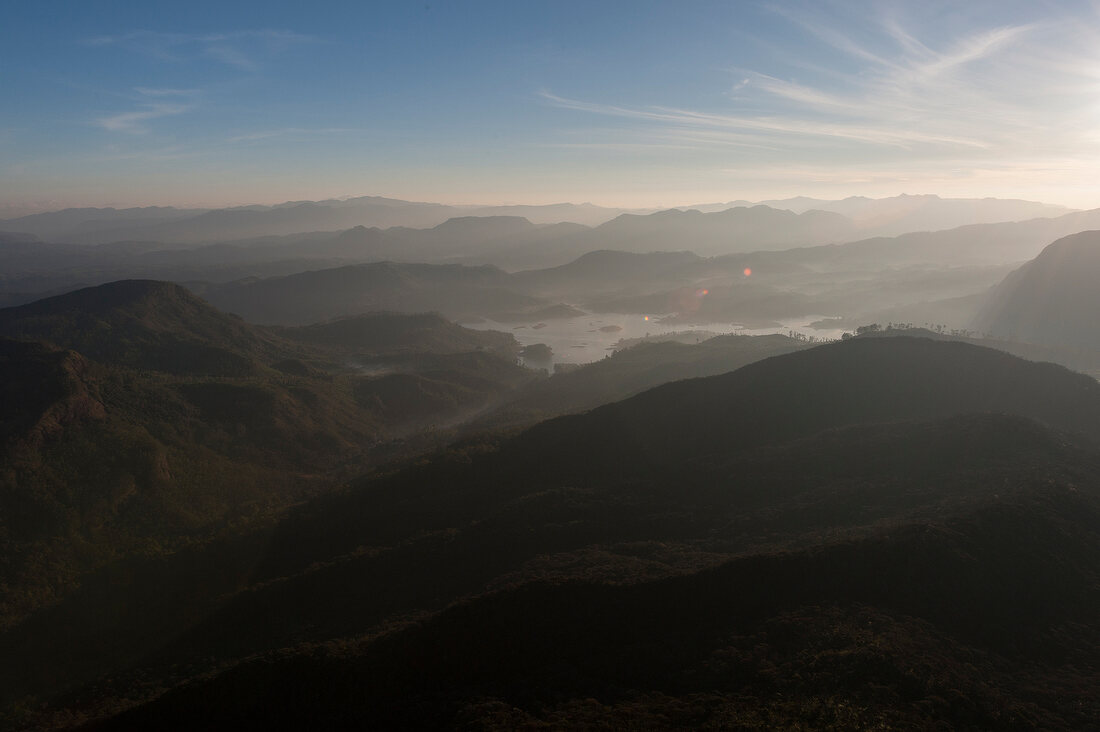 View of mountains with fog from Mount Sri Pada, Sri Lanka