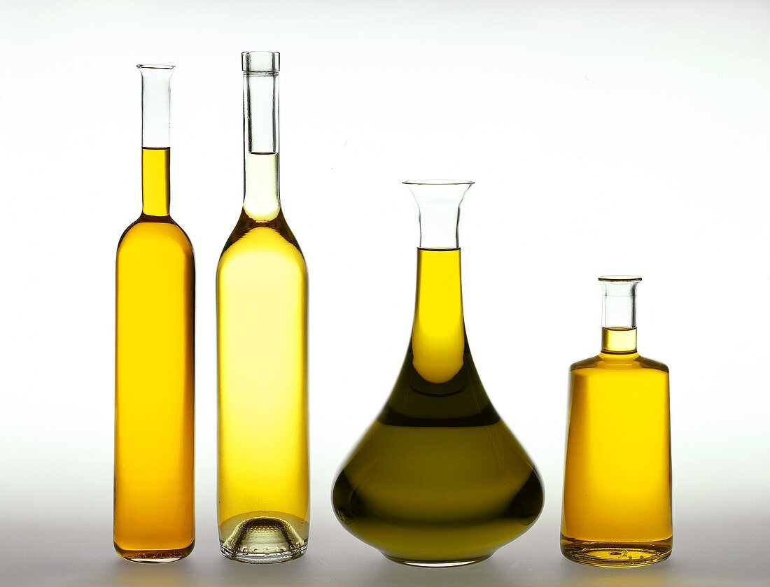 Various type of oil in glass carafes