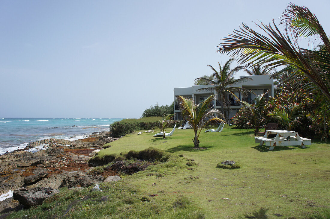 View of house with people at Lesser Antilles, Caribbean island, Barbados