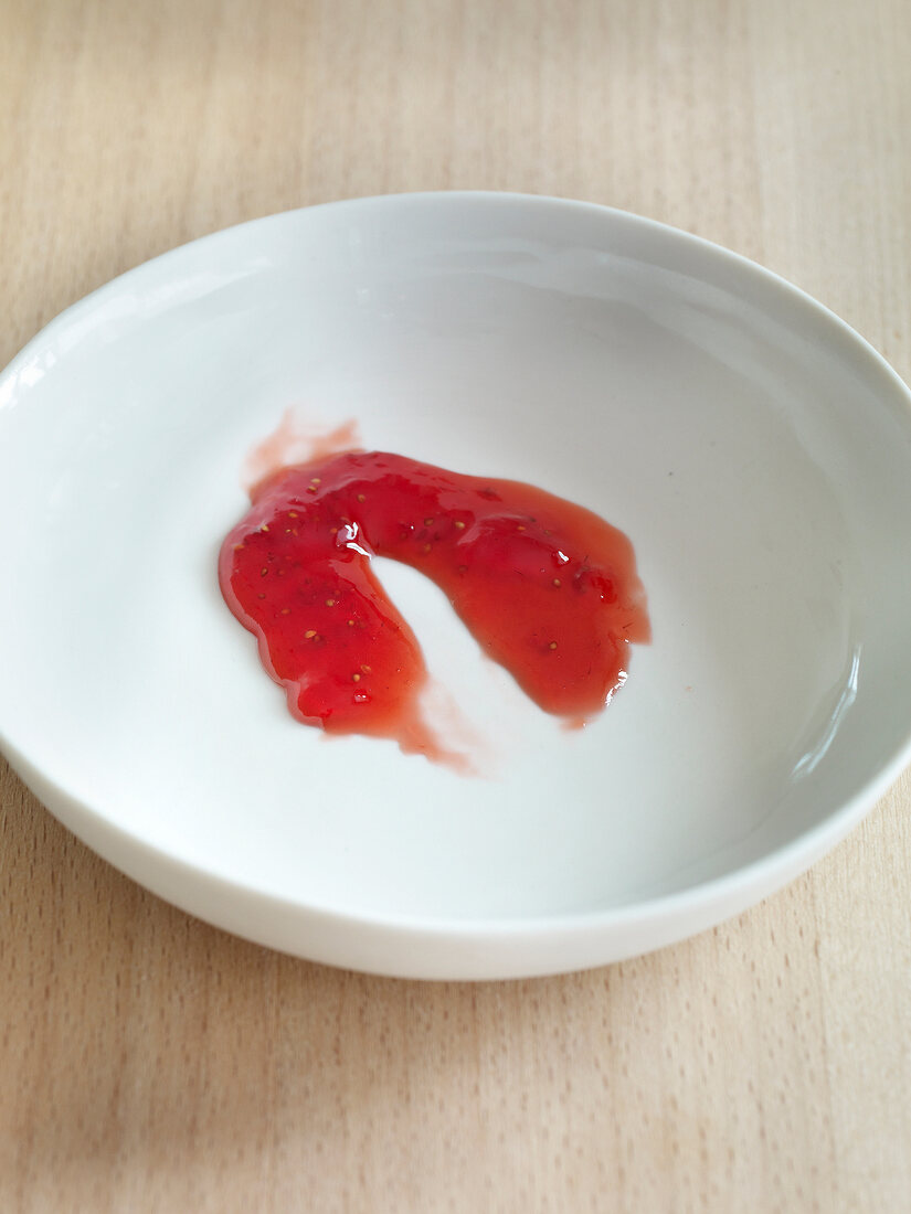 Close-up of blob of jam on plate