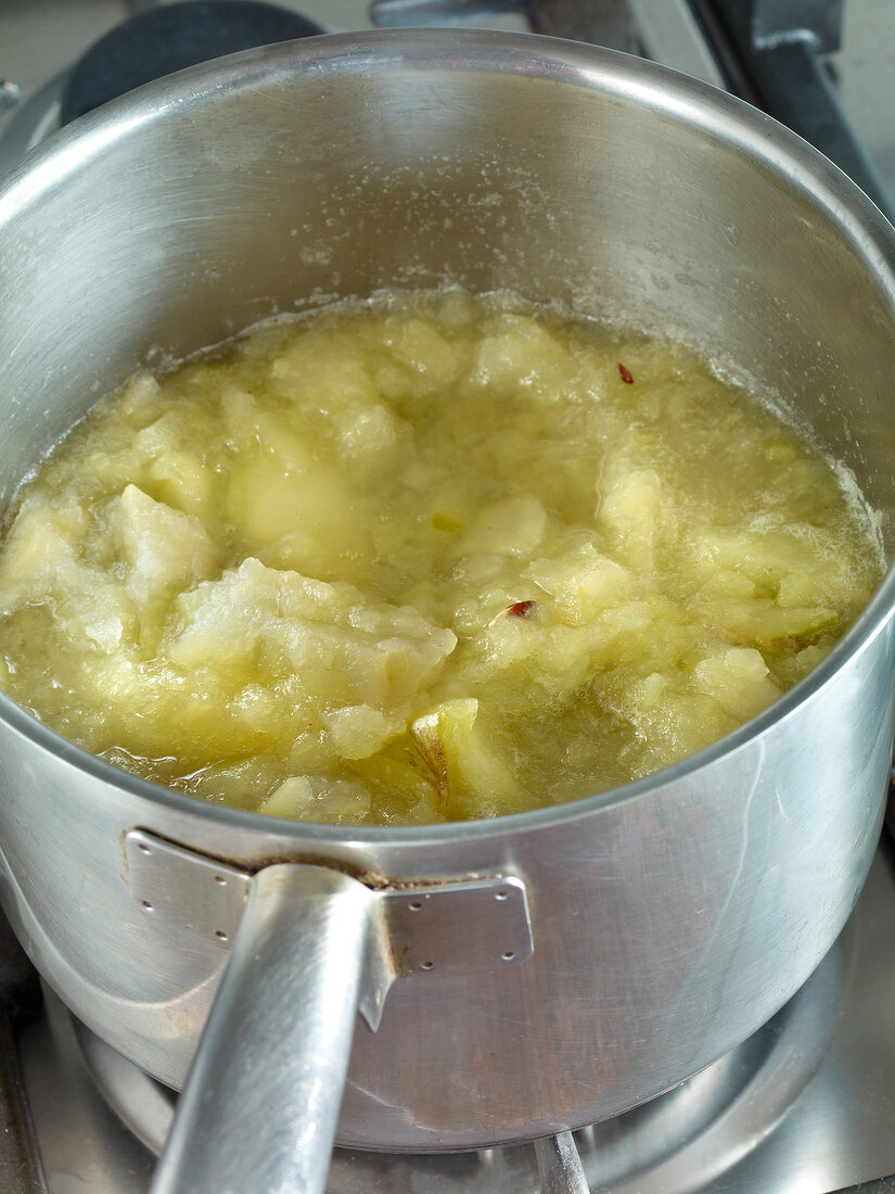 Close-up of marmalade being cooked in saucepan for preparation of jam