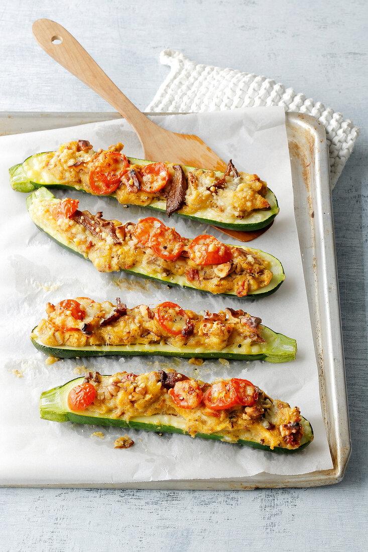 Stuffed zucchini in serving bowl, elevated view