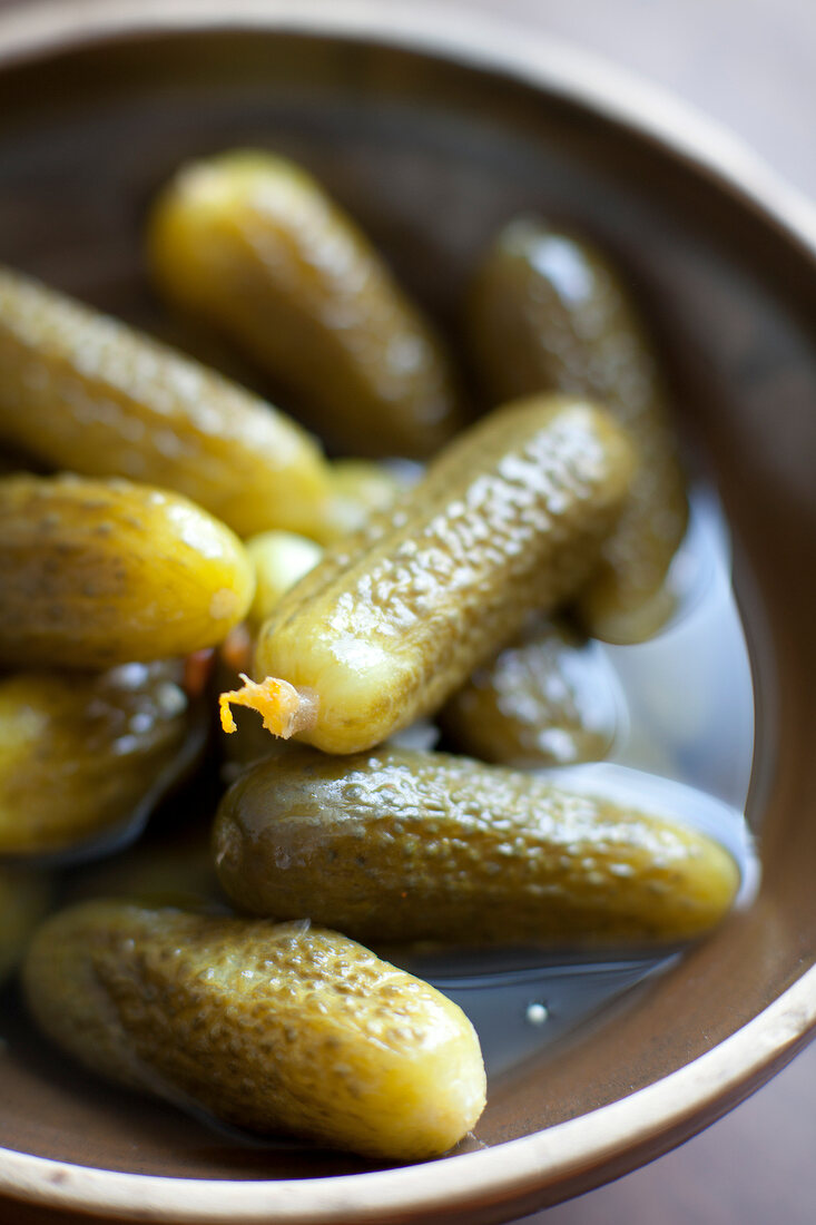 Close-up of gherkins in bowl