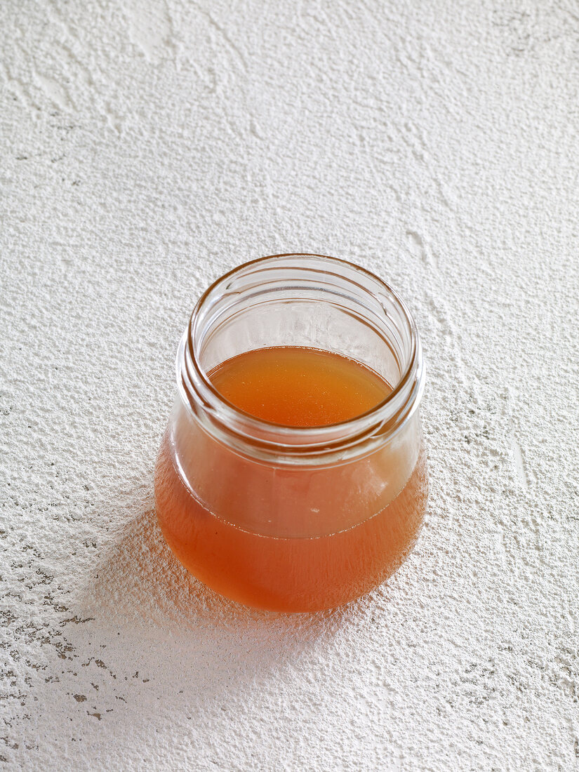 Apple punch jelly jam in glass jar