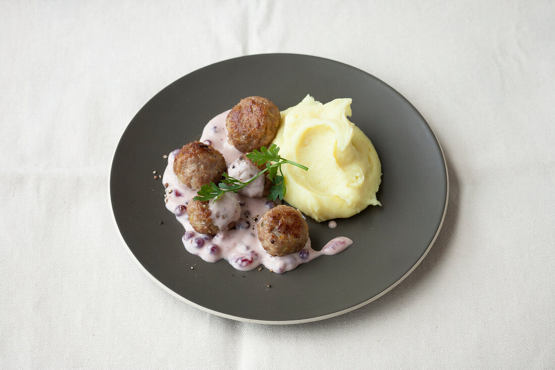 Meatballs of minced meat on gray plate