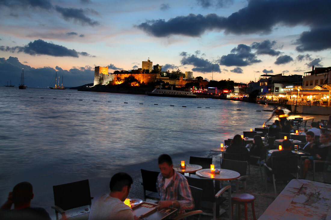 Illuminated cityscape of Bodrum at dusk, Aegean Region, Turkey