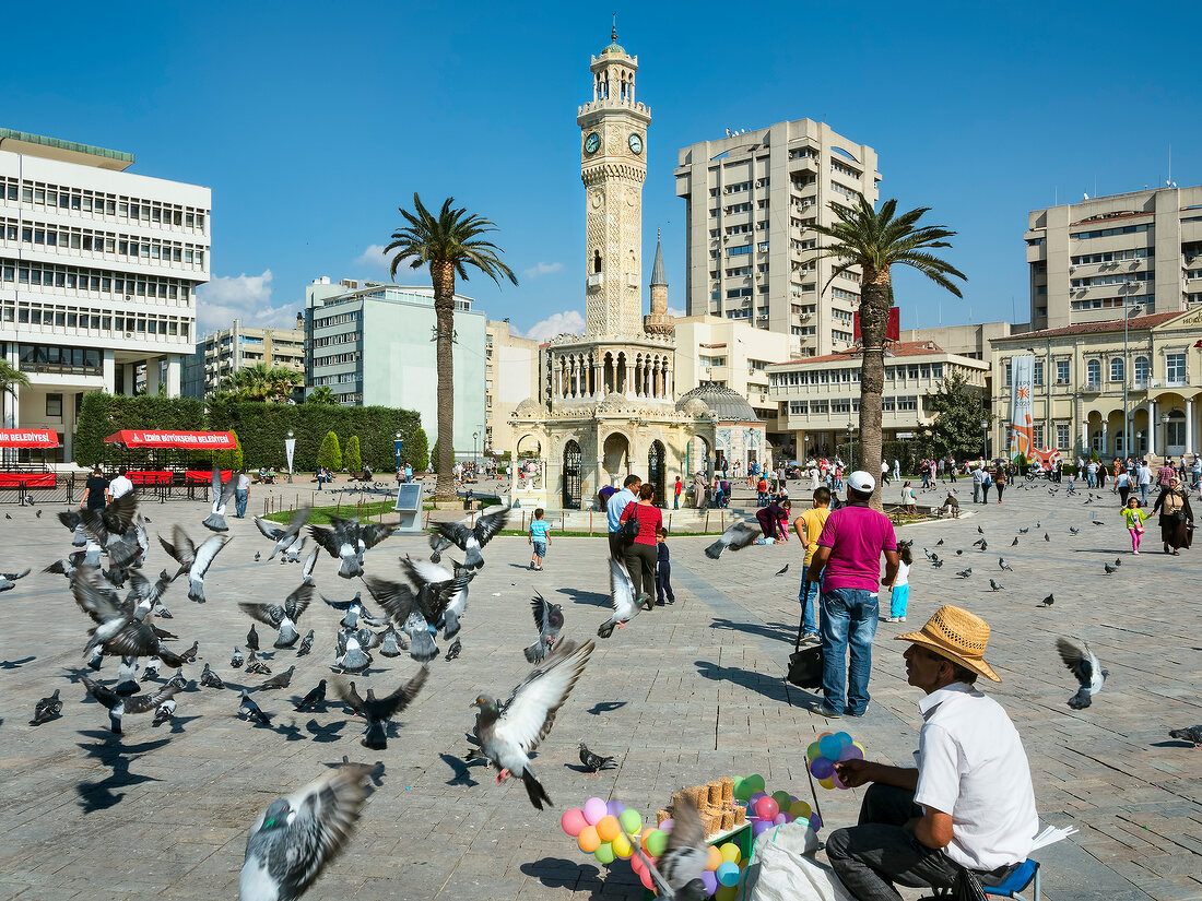 People at Konak Square in front of Izmir Clock Tower in Aegean Region, Turkey