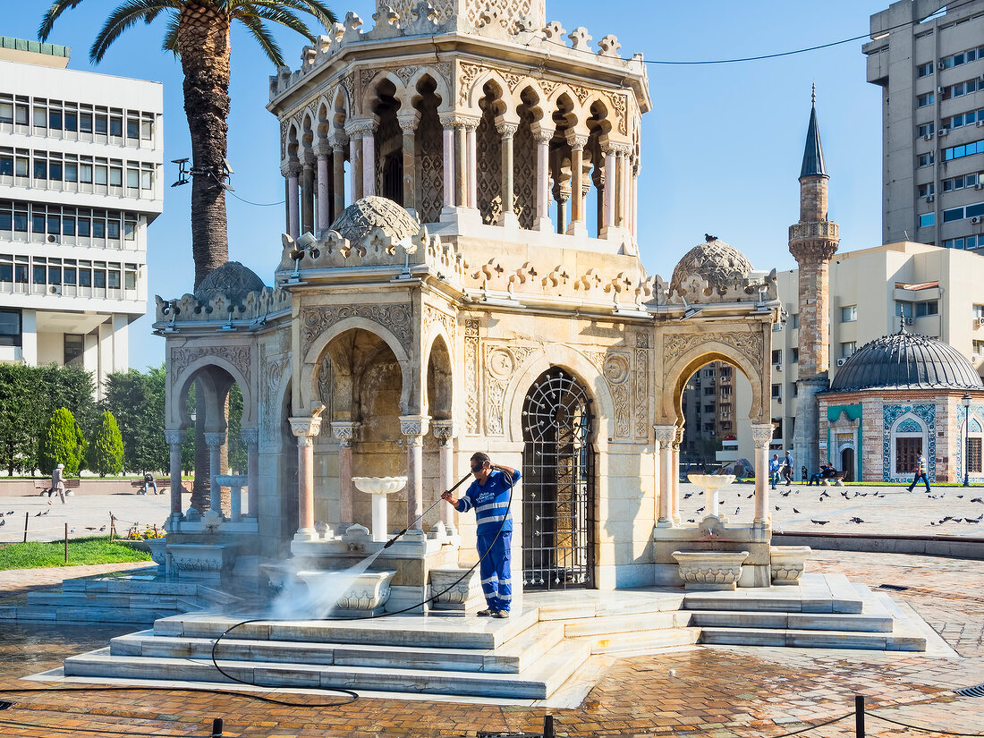 People at Konak Square in front of Izmir Clock Tower in Aegean Region, Turkey