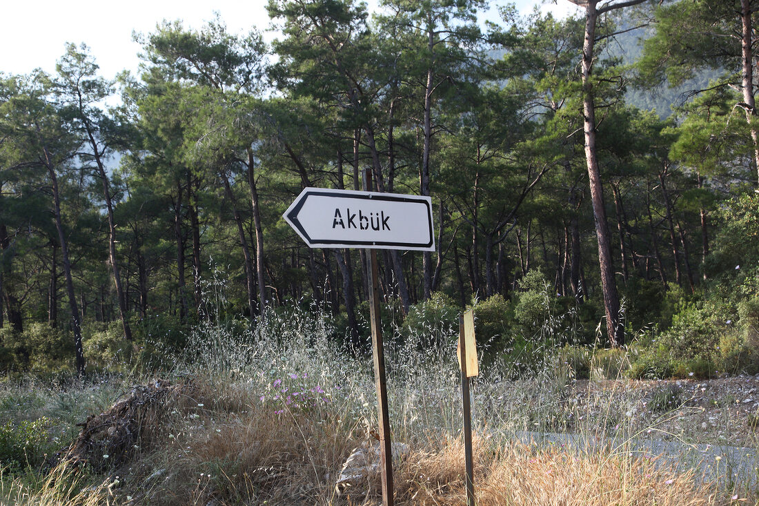 Signpost of Akbuk on beach, Aegean, Turkey