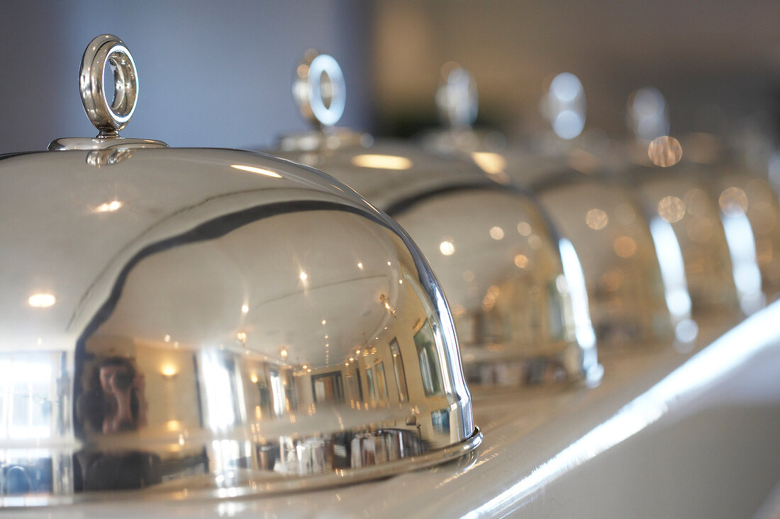 Close-up of dining bells for keeping dish warm in Restaurant Sol'ring Hof Sylt, Germany