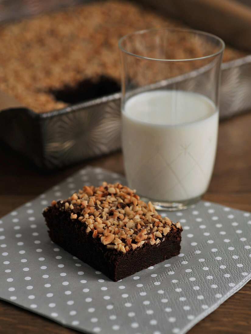 Baileys brownies with walnut crust and glass of milk