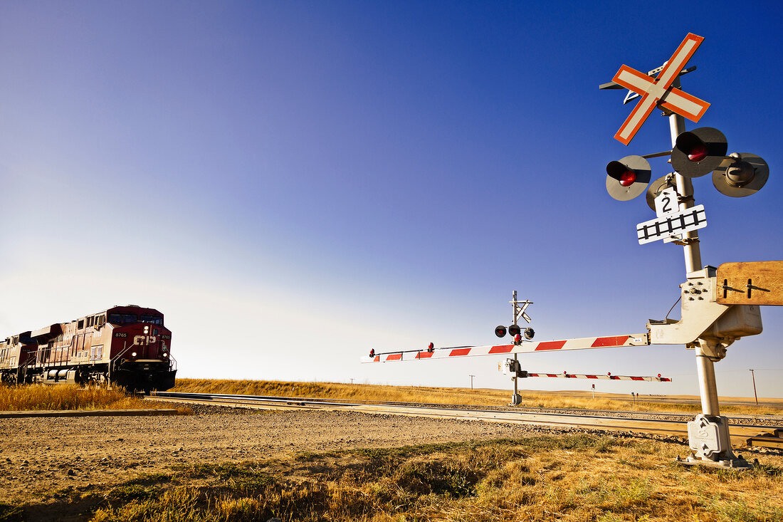 Railway crossing line at Highway 1 west to Alberta, Saskatchewan, Canada 