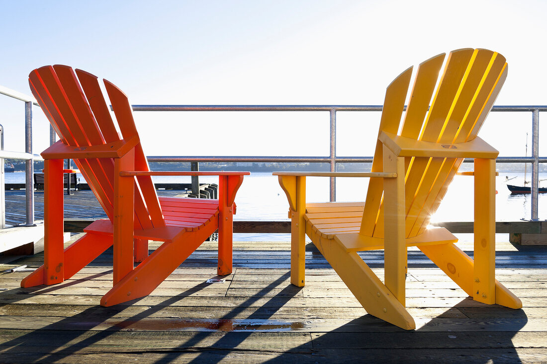 Red and yellow chair on deck at Halifax Regional Municipality, Nova Scotia, Canada
