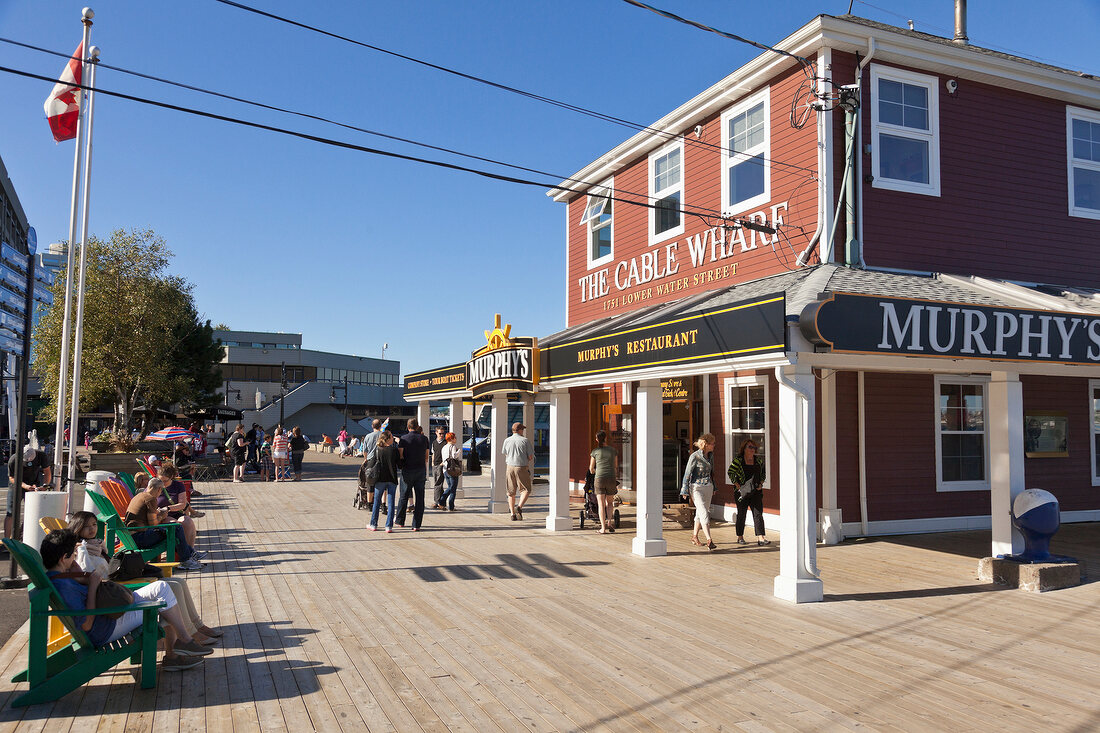 People walking outside The Cable Wharf, Halifax Regional Municipality, Nova Scotia, Canada