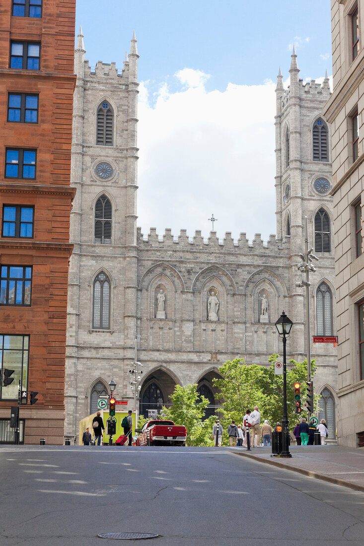 View of people outside Notre Dame Basilica church at Montreal, Canada