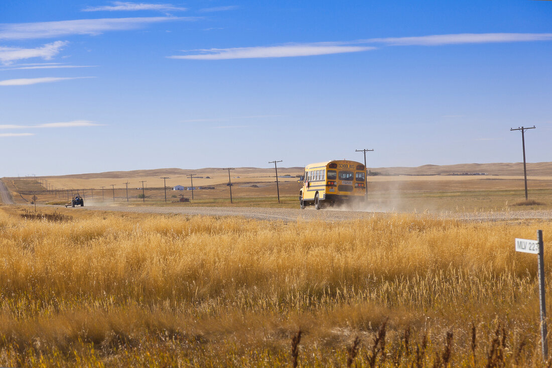 View of school bus on highway 4 North, Saskatchewan, Canada
