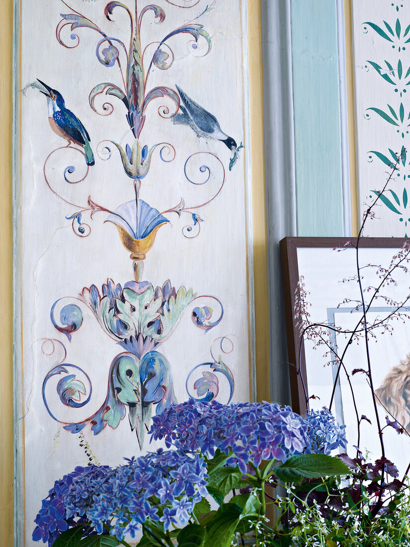 Wall of dining room with ornamental motifs of plants and birds at Castle Dennenlohe