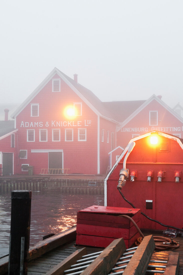 Fog in morning light at Lunenburg Harbour, Nova Scotia, Canada