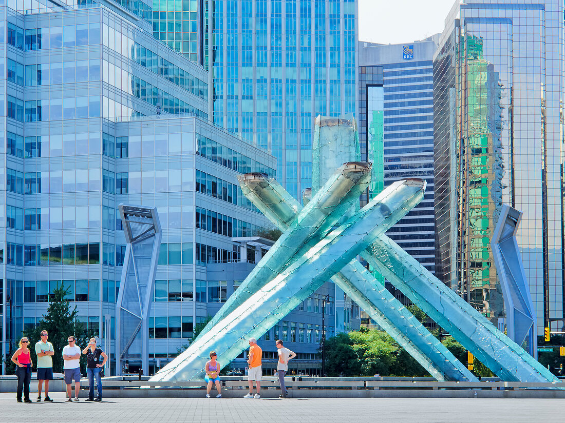 People standing in front of Canada place in Vancouver, British Columbia, Canada