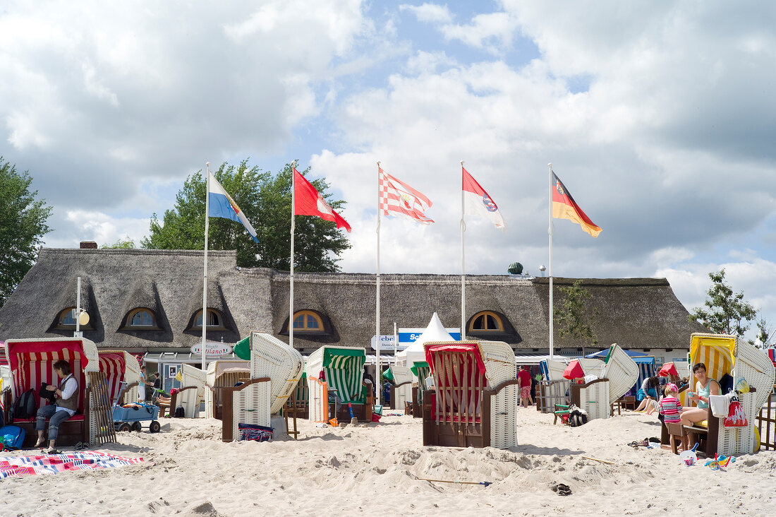 View of beach with various Flags, Baltic Sea, Dahme, Schleswig Holstein, Germany