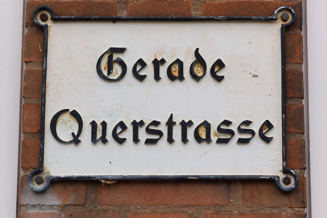 Close-up of signboard of straight cross street, Lubeck, Schleswig Holstein, Germany
