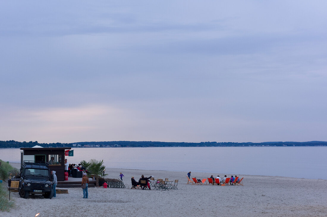 People sitting on beach lounge, Niendorf, Bay of Lubeck, Schleswig Holstein, Germany