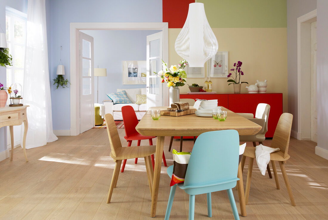 View of dining room overlooking living room in blue