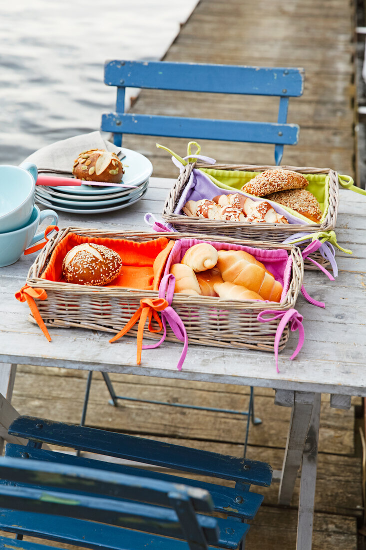 Bun baskets with buns on table