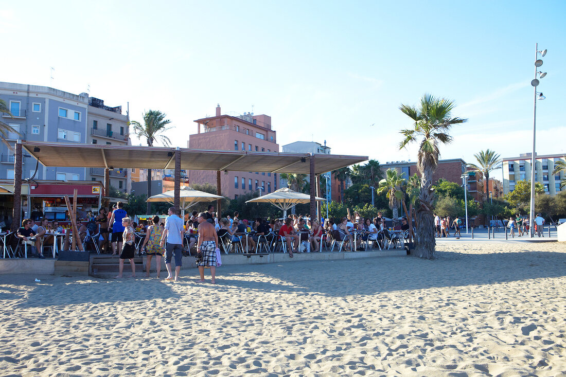 People sitting at Princesa 23 beach bar at Barcelona, Spain