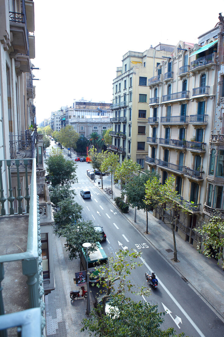 View of Sagrada Familia facade and street through building in Barceloan, Spain 