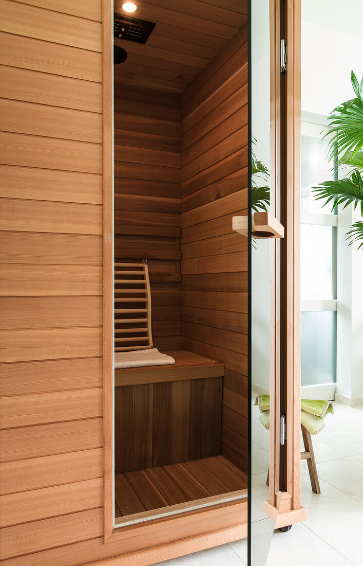 Wooden infrared sauna cabinet heated with infrared rays