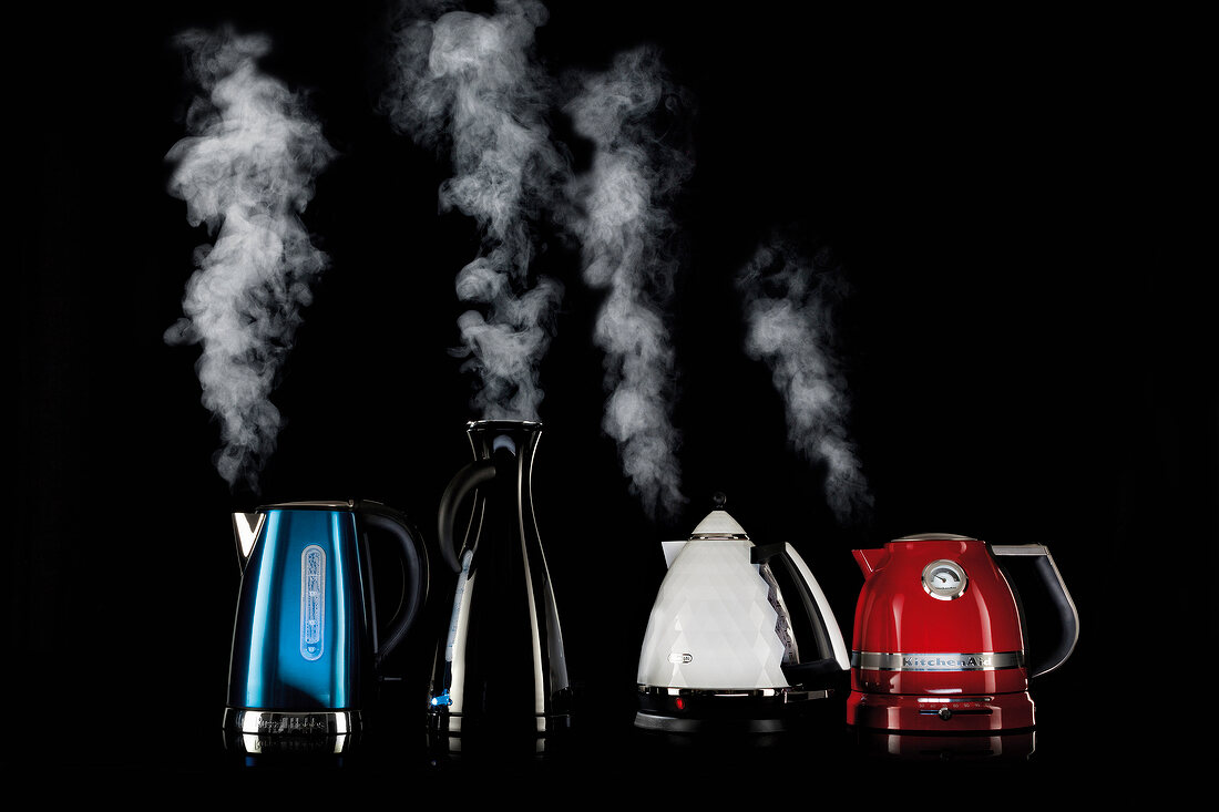 Steam coming out from four different kettles