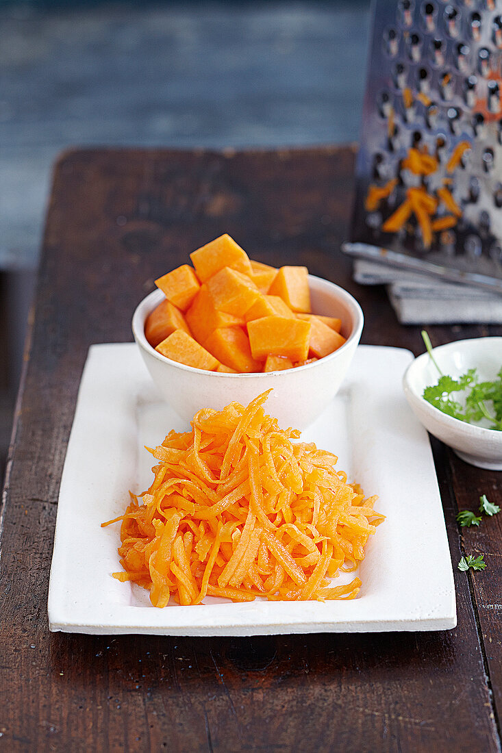 Pumpkin diced and grated on plate