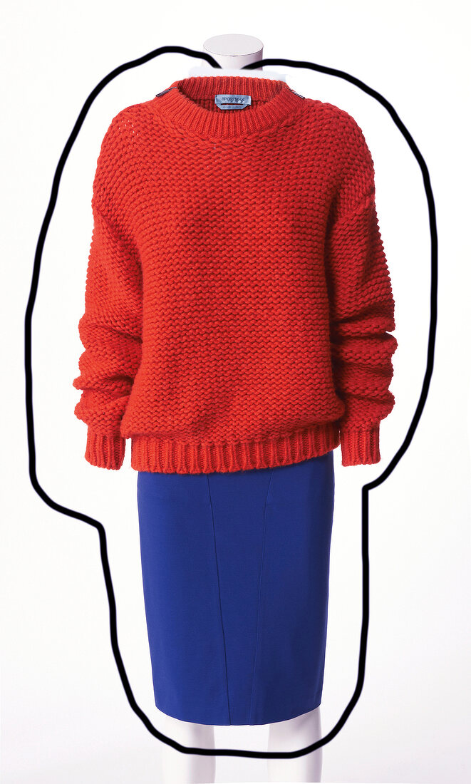 Red chunky sweater and blue pencil skirt on mannequin against white background