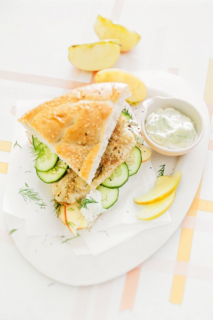 Zander fillet with apples and cucumber in unleavened bread