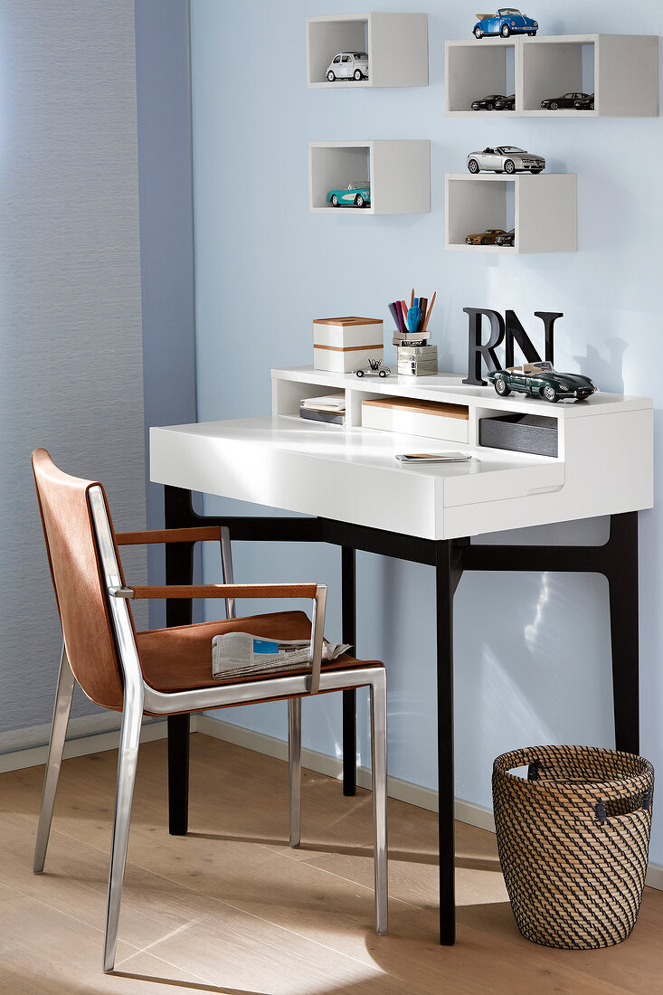 Close-up of home office secretary desk with flap and wall boxes