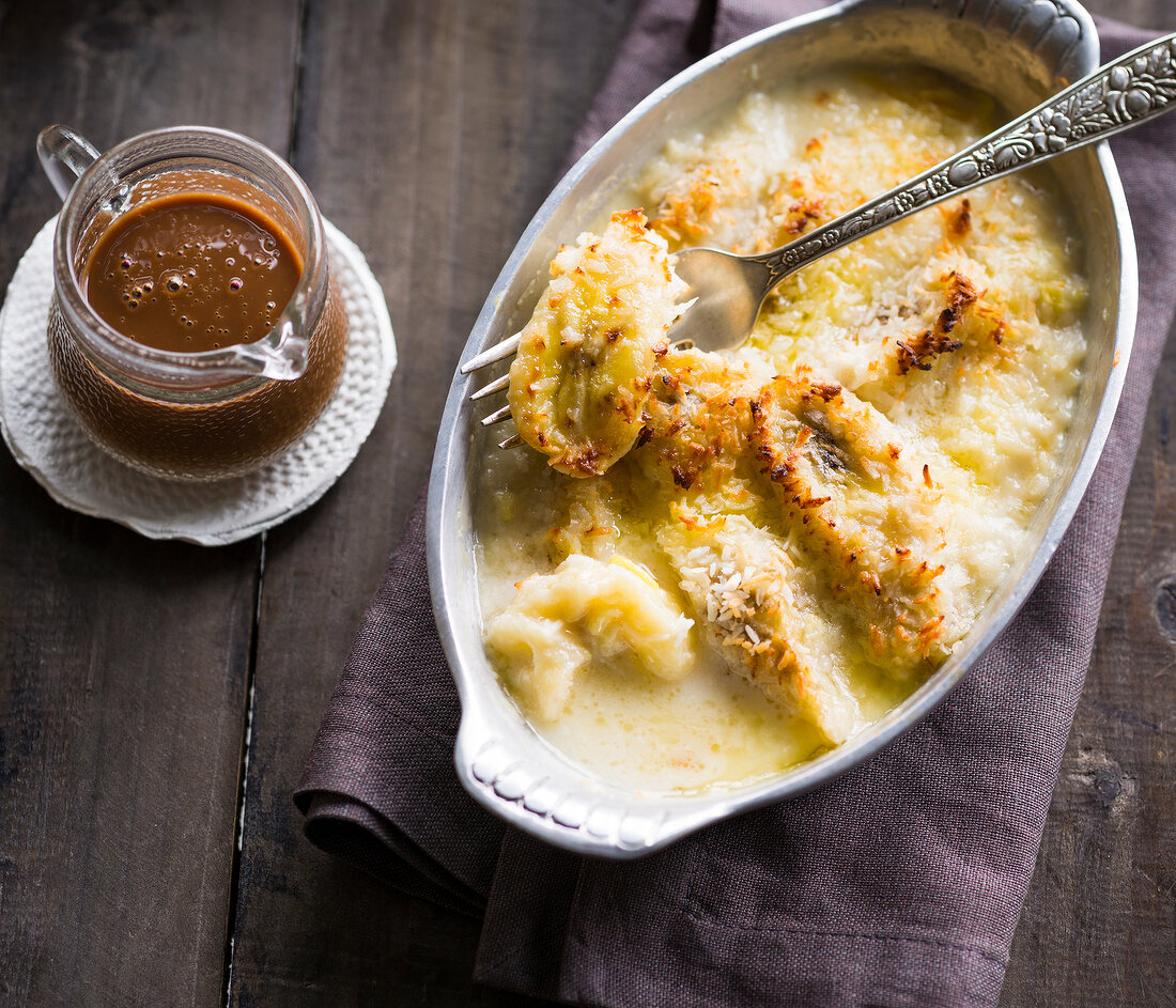 Banana gratin with coconut in casserole