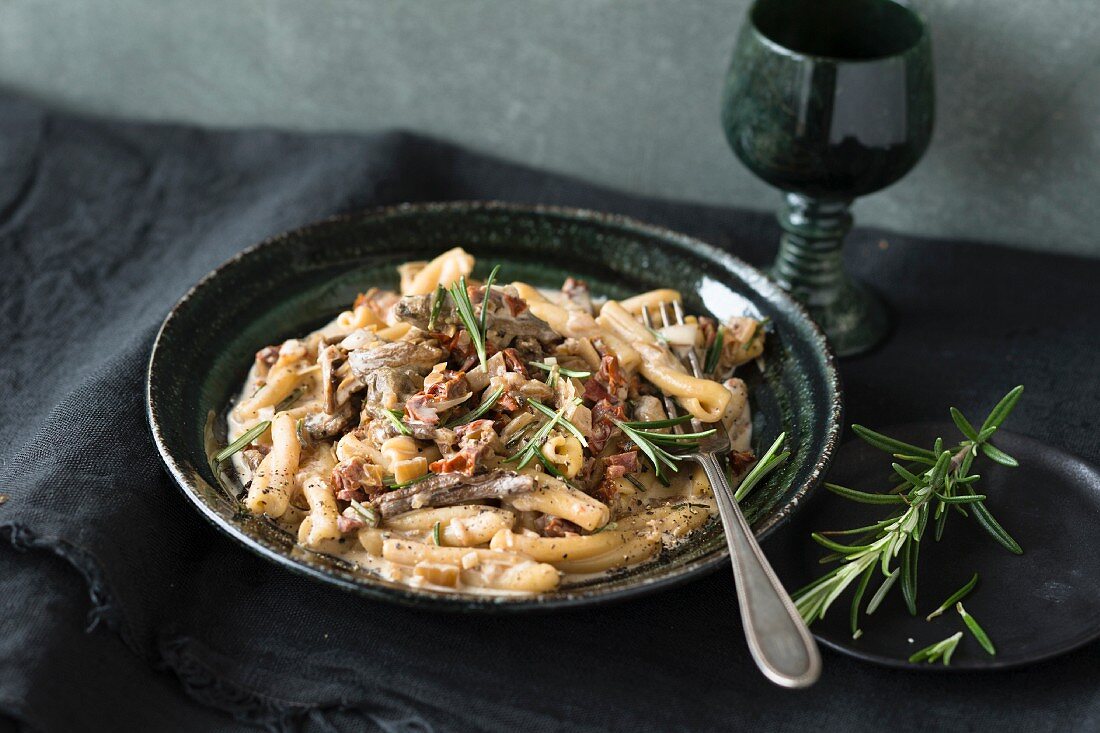 Casarecce with mushroom sauce and rosemary