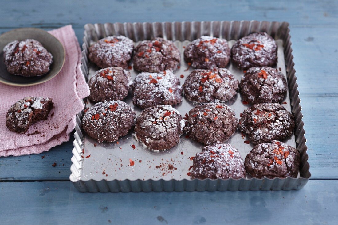 Chocolate biscuits on a baking tray