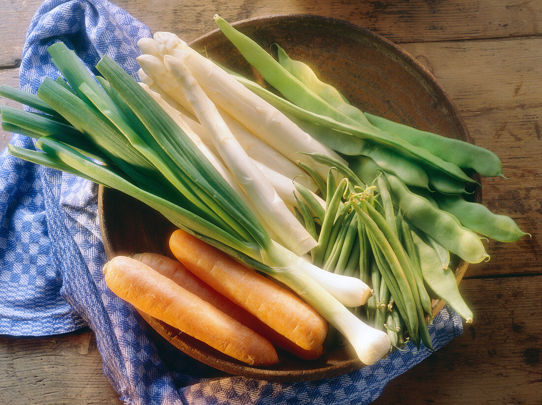 Beans and Asparagus; Spring Onions and Carrots in Clay Bowl