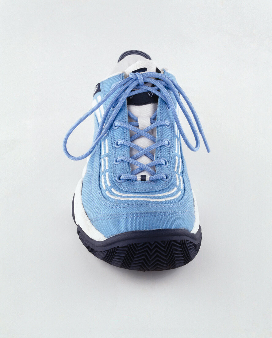 Close-up of sneaker on white background
